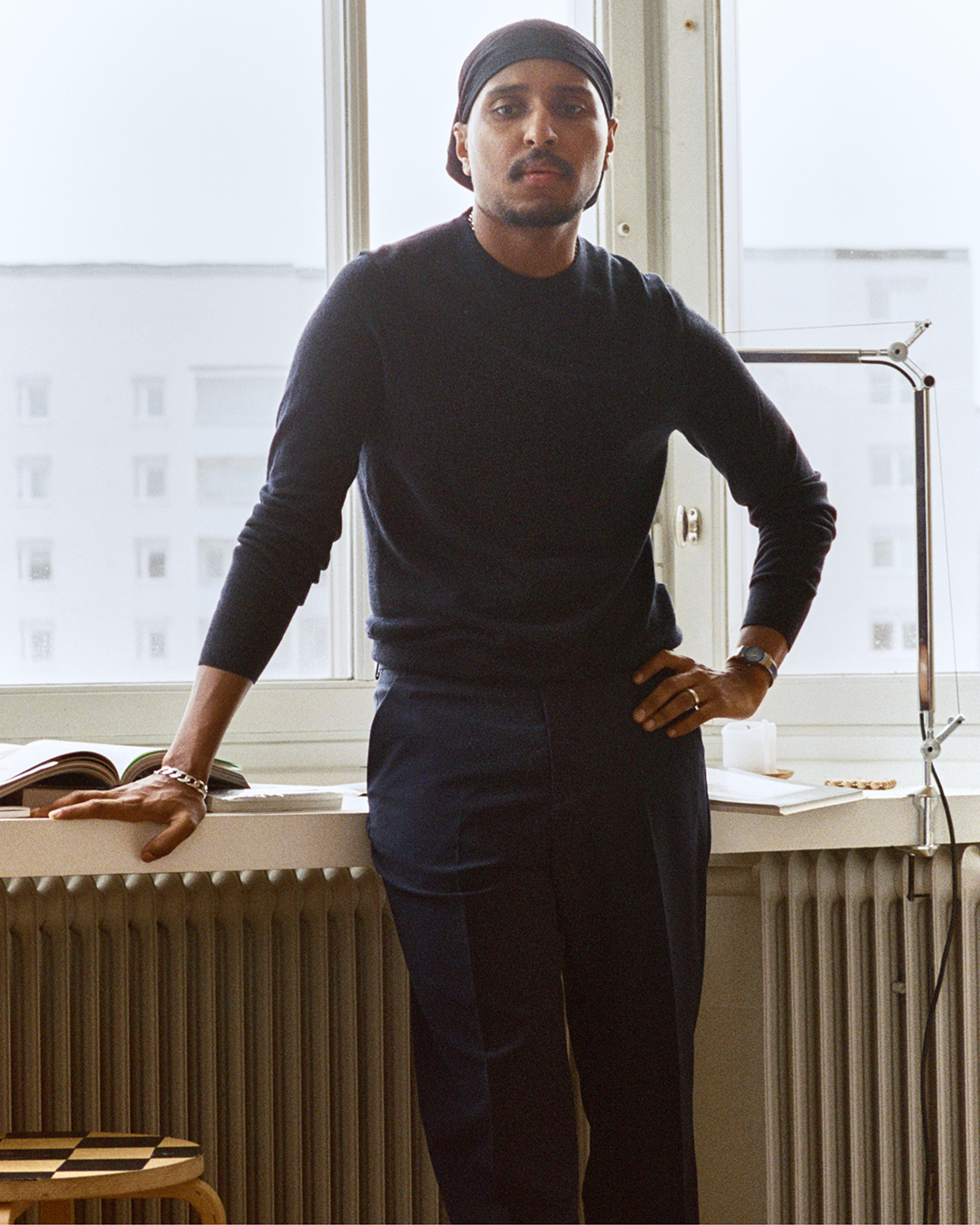 Haisam wearing connor sweater and trousers